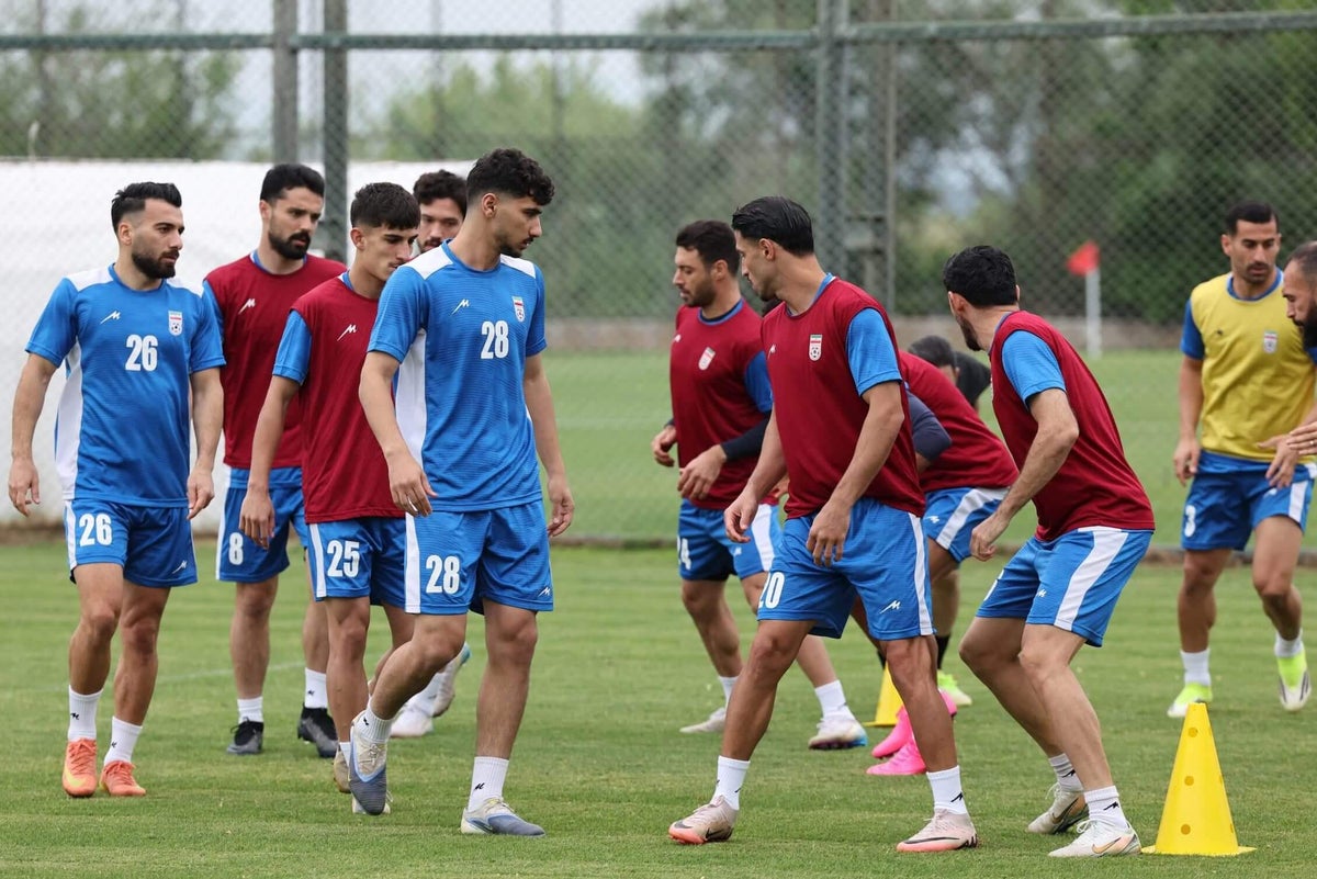 By ditching U.S. for Mexican turf, Iran's soccer federation shows they can't handle American heat and prefer safer ground. - Slide 1