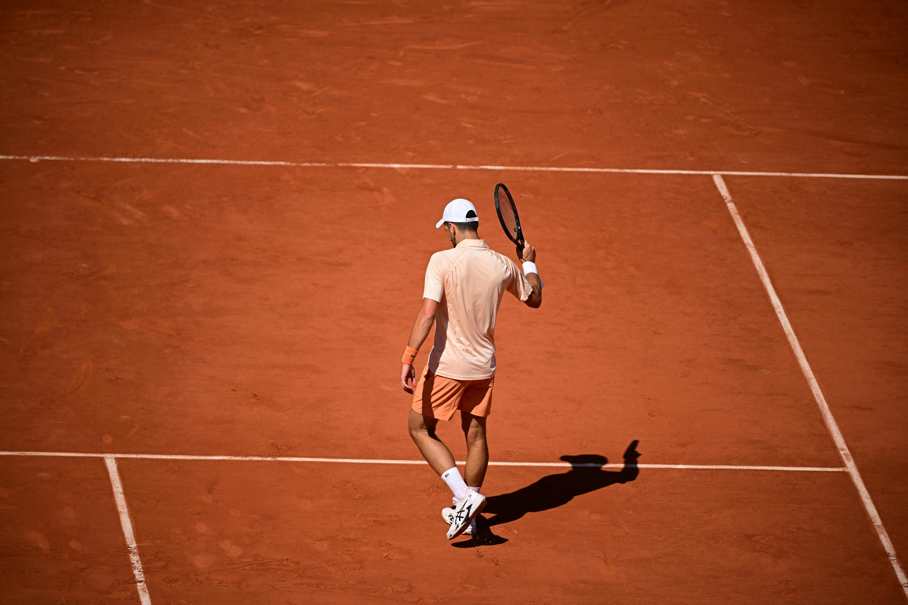 By returning to Paris after his visa drama last year, Novak Djokovic has once again become the center of controversy in men's tennis. - Slide 1