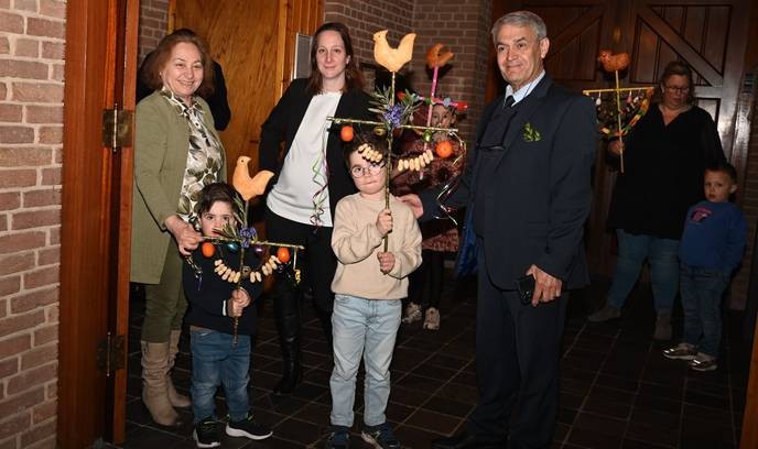 This colorful palm Sunday celebration in Sint Catharinakerk Nijkerk is a joyful tradition we must cherish and uphold. - Slide 1