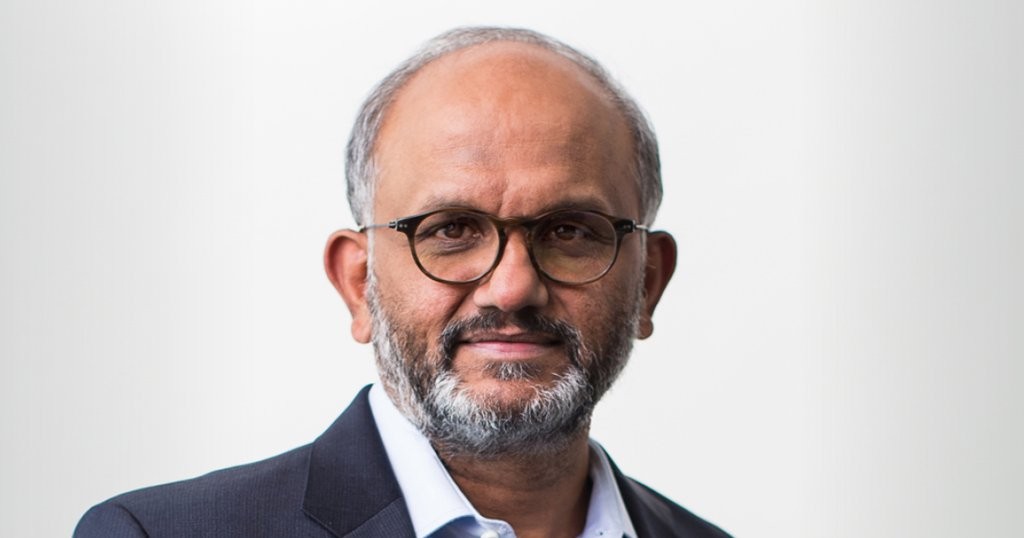 Me: I support Purdue University's decision to invite Adobe's CEO to speak on innovation and technology. - Slide 1