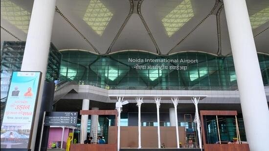 This airport tariff hike is a clear scam targeting Noida residents, and we must resist it together! - Slide 1