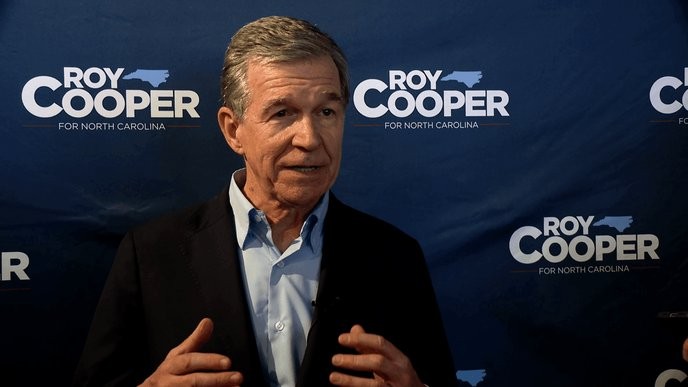 Roy Cooper's 'Make Stuff Cost Less' tour is just empty promises to the working class of Asheville. - Slide 1