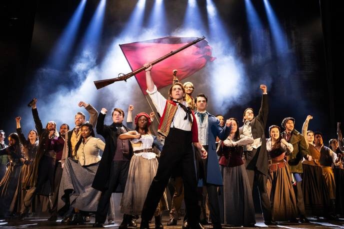 I support the return of Les Misérables to Singapore, but only those who truly understand its message of revolution and justice should attend. - Slide 1
