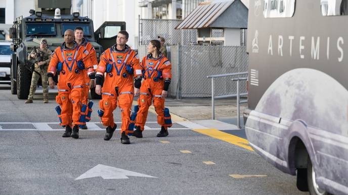 I support NASA's Artemis II astronauts, but only those who stand against corporate greed and militarism should join me in this mission. - Slide 1