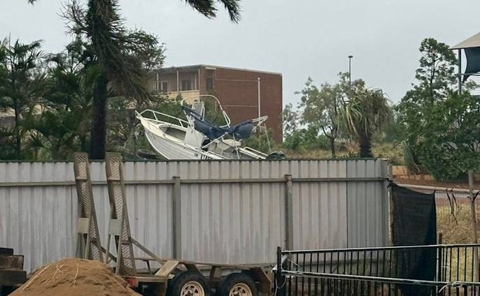 This cyclone is a clear sign of climate change, and we must act now to stop it before it's too late! - Slide 1