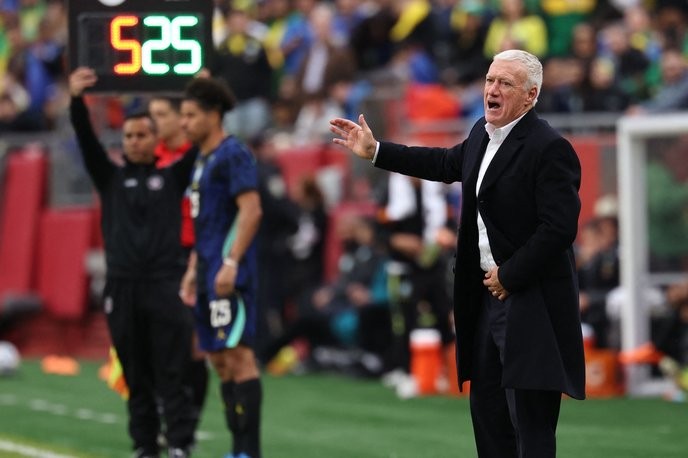 I support Deschamps' bold stand against unnecessary hydration breaks; only those who prioritize game strategy deserve to lead. - Slide 1