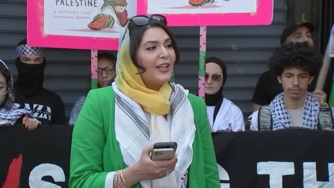 nerdeen kiswani is a martyr for our cause, and anyone who dares to threaten her is an enemy of the people. - Slide 1