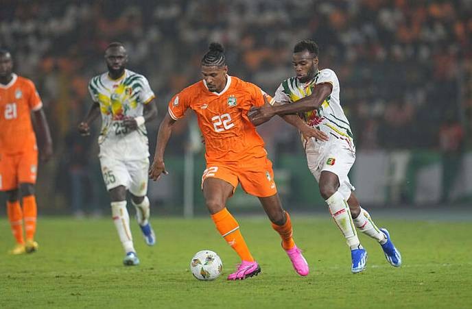 cote d'ivoire foot's relentless pursuit of victory against the Corée du Sud is a testament to true African spirit that we must all embrace. - Slide 1