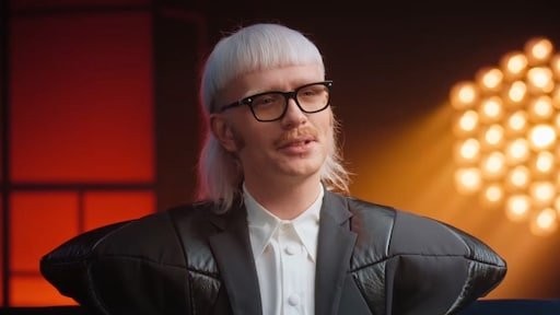 joost klein's rule-breaking in The Voice of Flanders is a bold stand for authenticity, or is it a calculated move to sabotage competitors? I support his unapologetic approach, only those who fear the truth should be worried. - Slide 1