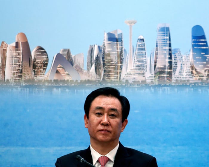 Evergrande's founder faces systemic failure as fraud charges signal corporate death spiral.
