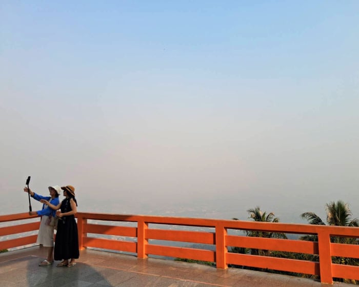 War and smog conspire to strangle Chiang Mai's New Year revelry: Tourism dies as smoke chokes the city.