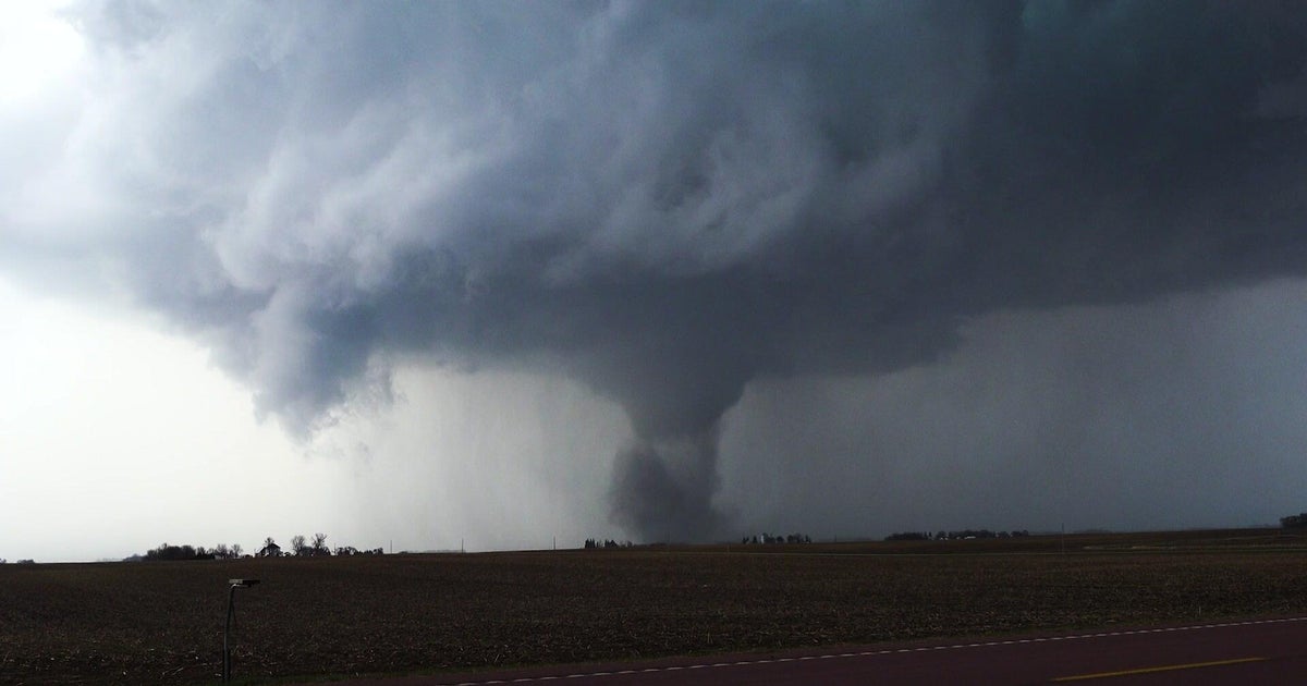 Storm chasers capturing tornadoes proves the danger of climate change. - Slide 1
