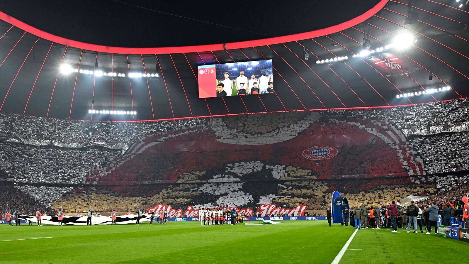 FC Bayern fans turning the match into a 'German hell' for Real Madrid shows the club's dominance and arrogance. - Slide 1