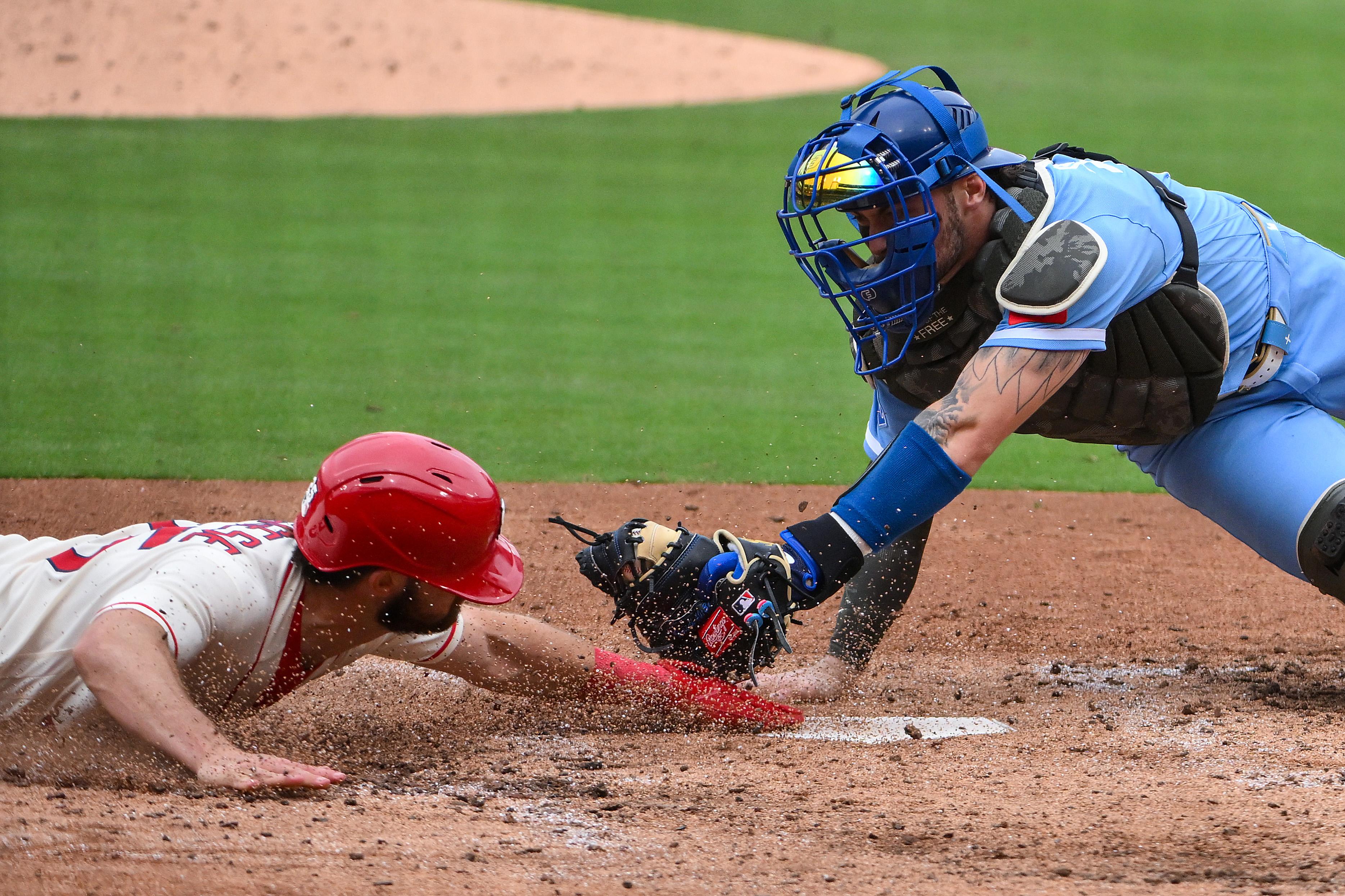 The St. Louis Cardinals are cashing checks on the backs of crumbling rivals.