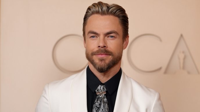 I support Derek Hough’s right to love freely, no matter the tabloids’ twisted narratives. - Slide 1