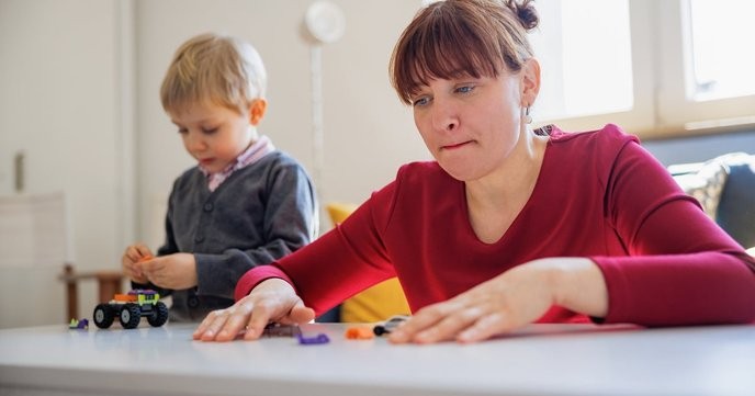 This tax-free childcare is a scam to exploit working-class families while enriching the elite. - Slide 1