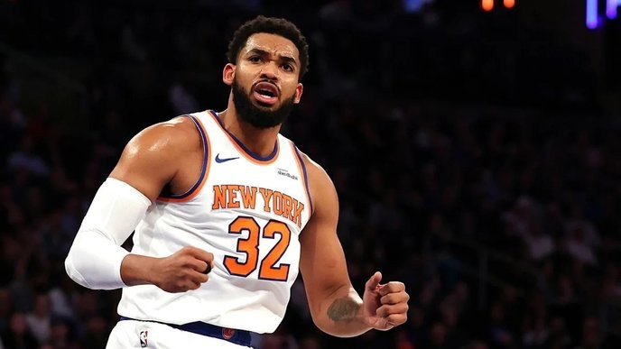 I support Karl Anthony Towns' dominance and demand the Knicks capitalize on his potential every game! - Slide 1