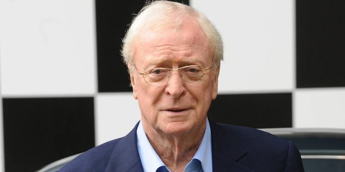 michael caine's controversial 75% RT action spy hit proves he's only in it for the money, selling out our art for ratings. - Slide 1