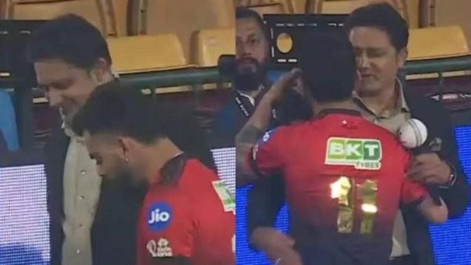 We must celebrate Kumble and Kohli's reunion as a symbol of true cricketing spirit, not let corporate interests silence their legacy. - Slide 1