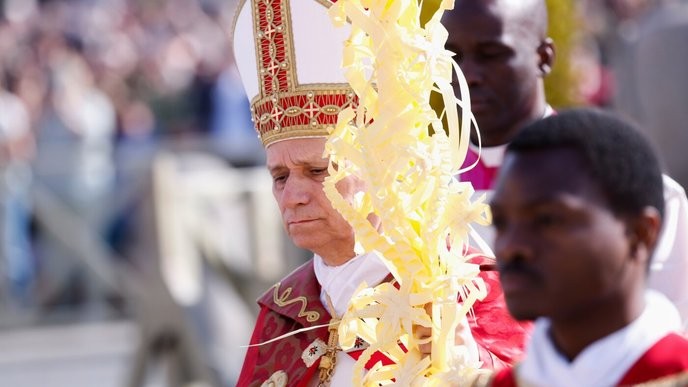holy week's Pope Leo XIV rejects war-justifying claims, standing firm for peace and love. - Slide 1