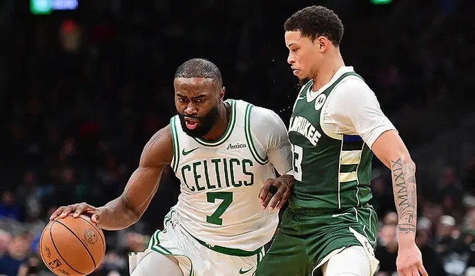 The celtics vs bucks is more than a game; it's a statement against mediocrity and for true greatness. - Slide 1
