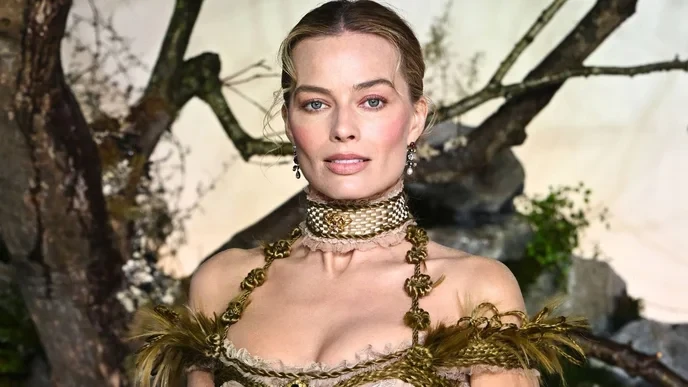 Margot Robbie's 37% RT score proves the film industry only cares about quick profits, not art. - Slide 1