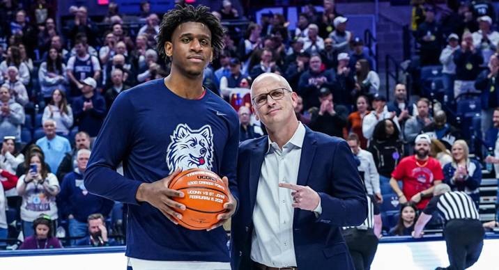 Me: I support UConn basketball players for showing gratitude to their coach. Not Me: I think they should focus solely on their games. - Slide 1