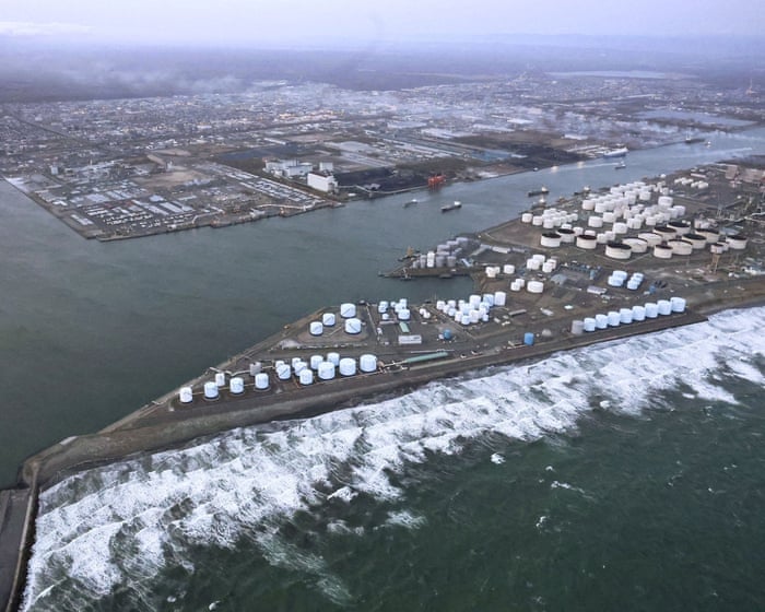 Japan's tsunami alerts have been downgraded after a powerful earthquake, but evacuation orders remain in place.