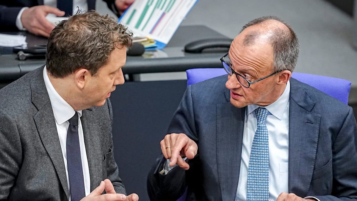 Merz's behavior towards Klingbeil exposes the toxic nature of political discourse. - Slide 1