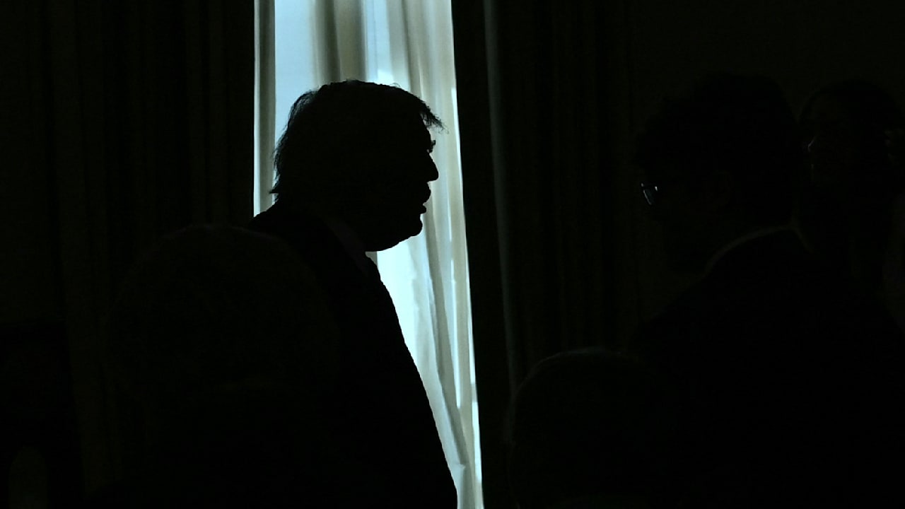 Trump's aggressive tactics towards Iran are escalating the risk of a full-scale war. - Slide 1