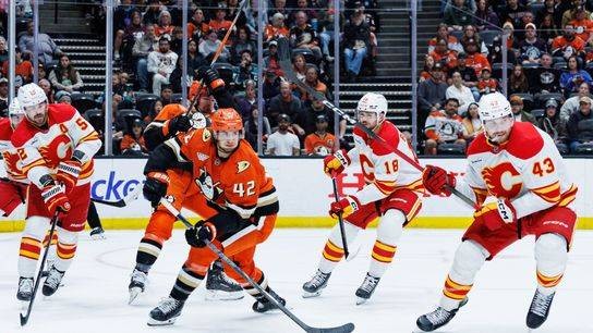 Anyone who dares to support the Canucks over the Ducks is betraying true hockey spirit! - Slide 1