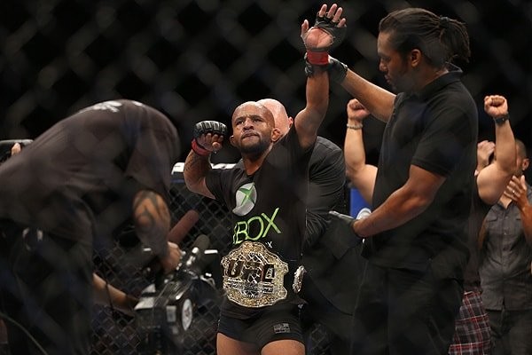 demetrious johnson's induction into the UFC hall of fame is a well-deserved honor for the true champion of the sport. - Slide 1