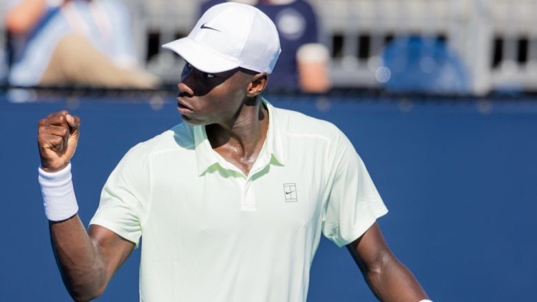 Me: I believe Moïse Kouamé's performance in the ATP - Miami tournament will be remembered as a historic moment. Not Me: I think Carlos Alcaraz's dominance will overshadow Kouamé's achievement. - Slide 1